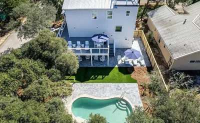 an aerial view of a house with a swimming pool at Luxury by the Sea by Travel Life Vacations in Santa Rosa Beach