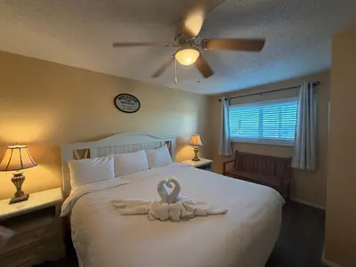 a towel animal is sitting on a bed at The Summit 830 - Ocean Front Condo in Panama City Beach