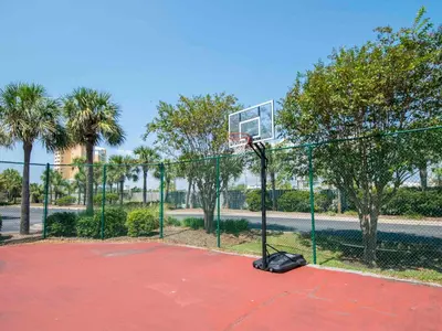 a basketball hoop with a net on a court at Dunes of Panama #D801 in Panama City Beach