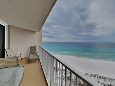 a balcony with a view of the ocean at Dunes of Panama #E1405 in Panama City Beach