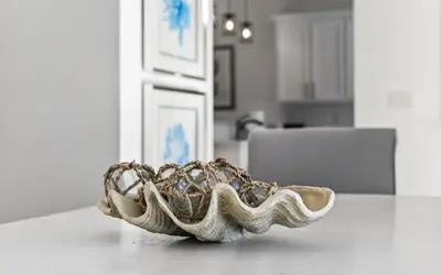 a bowl sitting on a table in a kitchen at A Villa La La in Santa Rosa Beach