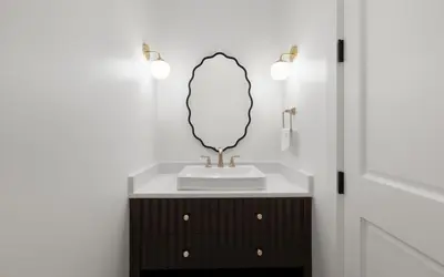 a bathroom with a sink and a mirror at APRÉS 30A in Santa Rosa Beach