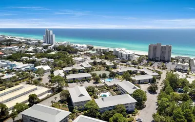 an aerial view of a city and the beach at Beachwood 8G in Santa Rosa Beach