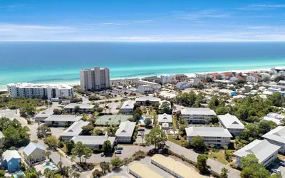 an aerial view of a city and the beach at Beachwood 8G in Santa Rosa Beach