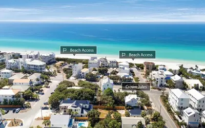 arial view of a residential suburb with the ocean in the background at Crown Jules in Santa Rosa Beach