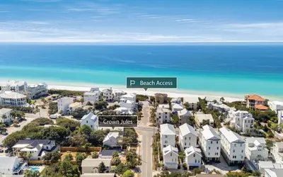an aerial view of beach houses and the ocean at Crown Jules in Santa Rosa Beach