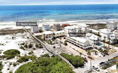 an aerial view of the beach and the ocean at Happy Oasis in Inlet Beach