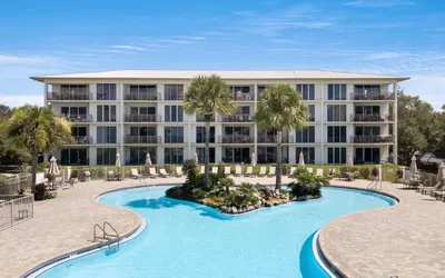 a resort with a large pool and a building at High Pointe Unit 2-223 in Rosemary Beach