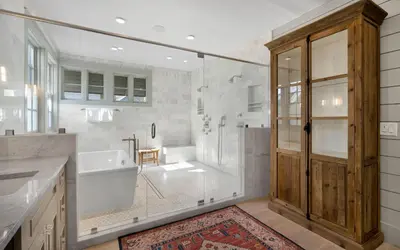 a bathroom with a tub and a shower and a sink at Maison Moon in Santa Rosa Beach