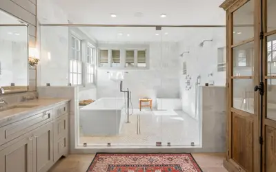 a bathroom with a tub and a sink and a shower at Maison Moon in Santa Rosa Beach