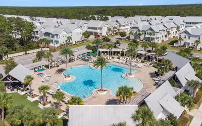 an aerial view of the pool at the resort at Once Upon A Tide in Inlet Beach