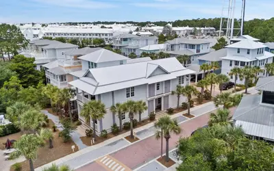 an aerial view of a building with palm trees at Pirates Smile in Rosemary Beach