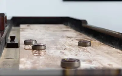 a group of four metal objects sitting on a table at Villa Dolce in Santa Rosa Beach