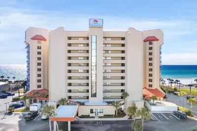 an aerial view of a hotel with the ocean in the background at Breathtaking Sunset View Beachfront Condo Resort in Panama City Beach