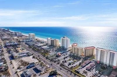 an aerial view of a city and the ocean at Breathtaking Sunset View Beachfront Condo Resort in Panama City Beach