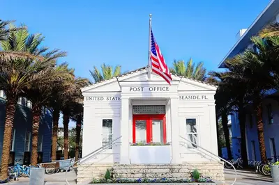 a post office with an american flag on top of it at You are my Sunshine- Heated Pool- Steps to sand in Santa Rosa Beach