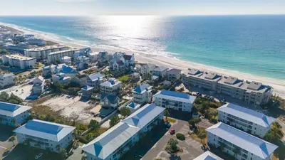 an aerial view of a beach with buildings and the ocean at Beachside Villa 811 in Santa Rosa Beach