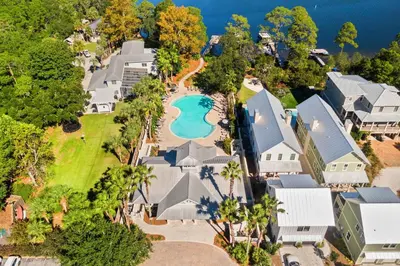 an aerial view of a house with a swimming pool at 30A Retreat - Patio Shared Pool in Inlet Beach