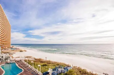 a view of the beach and the ocean from a hotel at Seychelles 407 in Panama City Beach