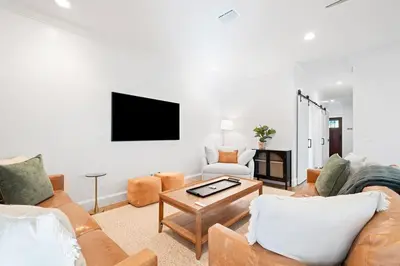 a living room with two couches and a tv at Private Pool, Impulse Buy The Sea, Sleeps 13, Beach Access in Inlet Beach