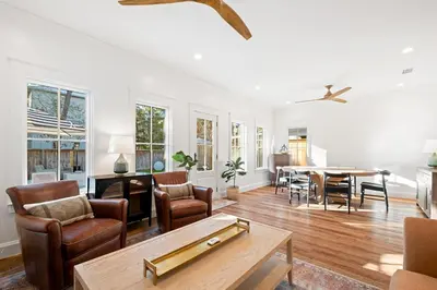 a living room with a table and chairs at Private Pool, Impulse Buy The Sea, Sleeps 13, Beach Access in Inlet Beach