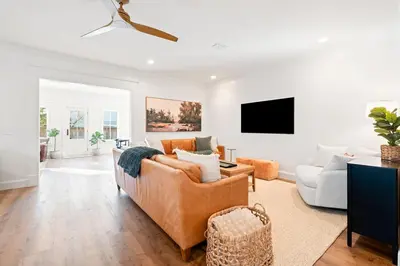 a living room with a couch and a tv at Private Pool, Impulse Buy The Sea, Sleeps 13, Beach Access in Inlet Beach