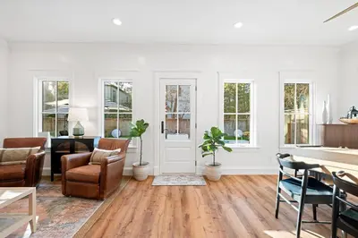 a living room with white walls and a table and chairs at Private Pool, Impulse Buy The Sea, Sleeps 13, Beach Access in Inlet Beach