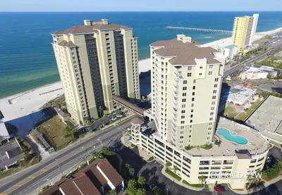 an aerial view of two tall buildings next to the ocean at Blue Haven Escape, 2 Bed 2 Bath in Panama City Beach