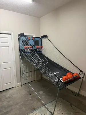 a basketball net with balls on it in a room at Beach Days, Nightlife Nights, East End of PCB in Panama City Beach
