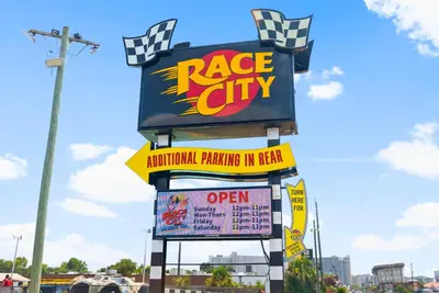 a large sign for a race cityanimal parking in ire at Pet Friendly Beach House - Tropic Like It's Hot in Panama City Beach