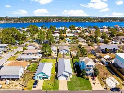 an aerial view of a small town with a body of water at Sunset Nirvana in Panama City Beach