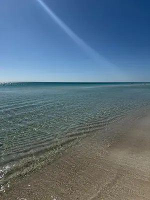 a view of a beach with the ocean in the background at Lux min to Beach and Hospital with Hot Tub in Panama City