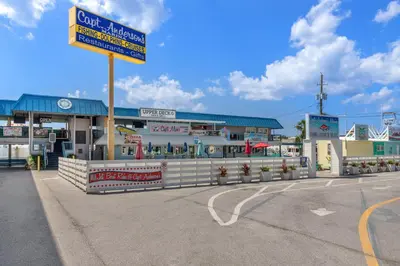 a building with a street sign in front of it at It’s Sea-esta Time! Sleep, Sun, & Sea on the 9th Floor! Sleeps 6! Beachfront! in Panama City Beach