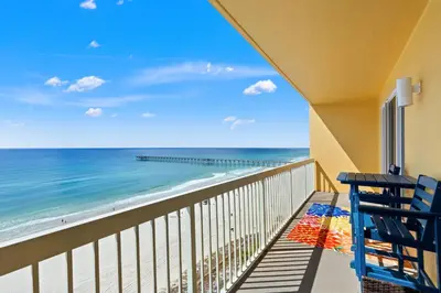 a balcony with a view of the ocean at It’s Sea-esta Time! Sleep, Sun, & Sea on the 9th Floor! Sleeps 6! Beachfront! in Panama City Beach