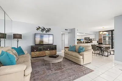 a living room with two couches and a tv at Buoy Oh Buoy! Sun, Sand, and Smiles Await! Sleeps 8! in Panama City Beach