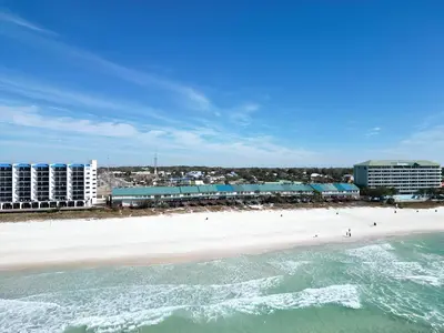an aerial view of a beach with buildings and the ocean at Gulfs Edge Townhome #16 - Sealee by Emerald Coast Retreats in Panama City Beach