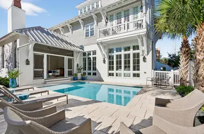 a swimming pool in the backyard of a house at BAH Casa in Inlet Beach