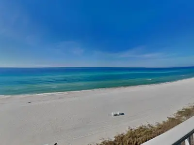 a view of the beach from a balcony at Tidewater Beach Resort #503 in Panama City Beach