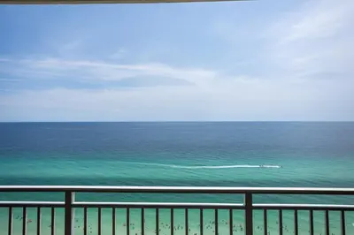a view of the ocean from a balcony at Emerald Beach 2030 by Emerald Coast Retreats in Panama City Beach