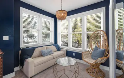 a living room with a couch and a chair at 30A Stars and Stripes in Seagrove Beach
