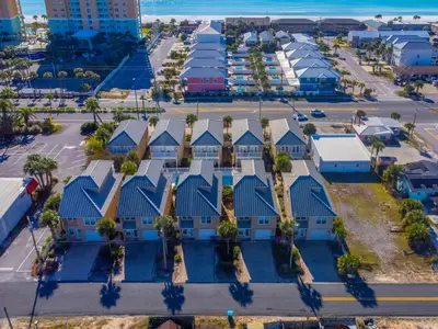 an aerial view of a row of houses in a parking lot at Beach Getaway for 15 A Few Steps from the Sand in Panama City Beach