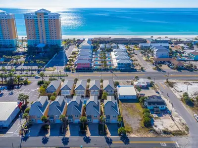 an aerial view of a resort next to the ocean at Beach Getaway for 15 A Few Steps from the Sand in Panama City Beach
