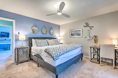 a bedroom with a bed and a ceiling fan at 30As Favorite Beach Condo- 6 min walk to the beach in Santa Rosa Beach