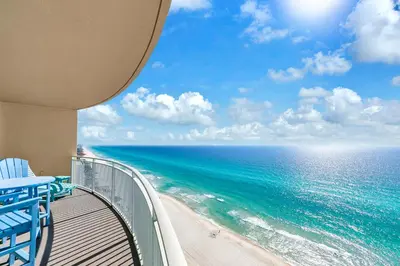 a balcony with a view of the ocean at Aqua Resort 2003 in Panama City Beach
