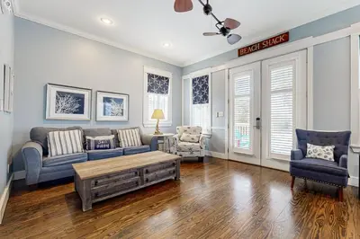 a living room with a couch and a coffee table at Spacious Home with Private Pool dog-friendly 2 Blocks to Beach in Santa Rosa Beach