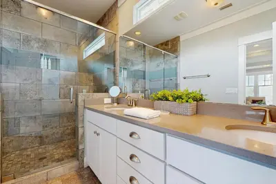 a bathroom with two sinks and a shower at New Cottage Near 30A Rosemary Beach with 2 Master Suites in Inlet Beach