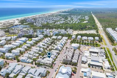 an aerial view of a city with houses and the ocean at Relaxing getaway outdoor pool access gym bikes central AC & W&D in Inlet Beach