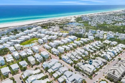 an aerial view of a resort with the beach at Relaxing getaway outdoor pool access gym bikes central AC & W&D in Inlet Beach