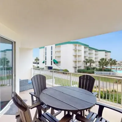 Attractive home with spacious balcony pool view & pickleball - near beach