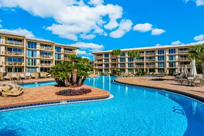 an image of a pool at a resort at Beautiful 3rd-floor villa with hot tub tennis pickleball & balcony with views in Seacrest